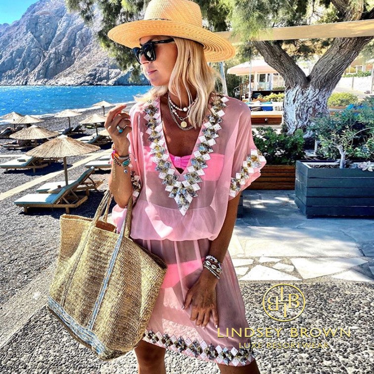 Miami silk designer kaftans in baby pink by Lindsey Brown resort wear are perfect for every holiday to wear over swimwear by luxury resort wear brand Lindsey Brown