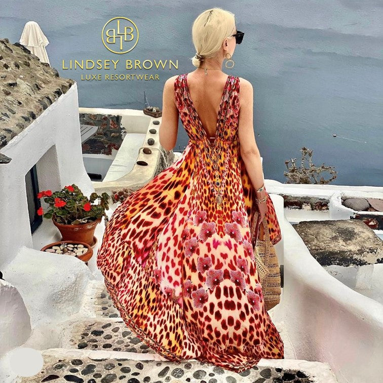 Anna Mavridis wears red animal print maxi dress on holiday by lindsey brown resort wear