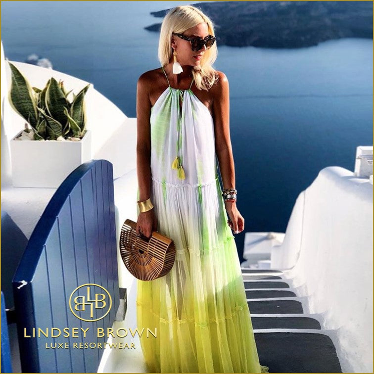 Anna Mavridis wears yellow silk maxi dress to wear on holiday in Santorini