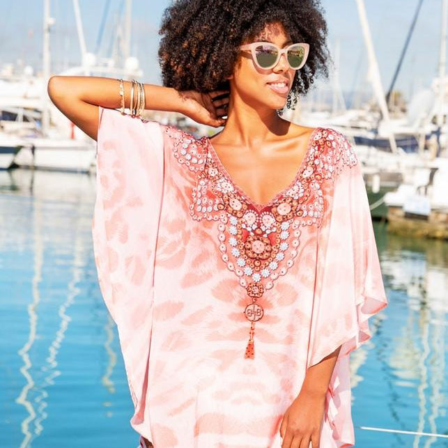 pink designer kaftans to wear on holiday by lindsey brown resort wear