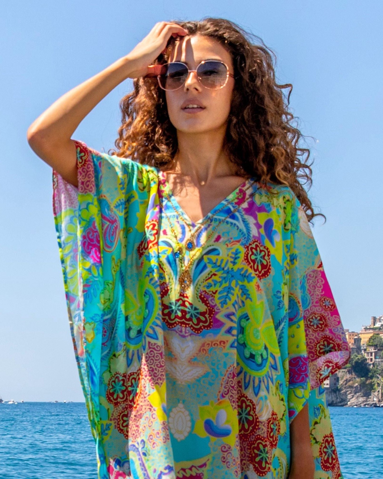 Designer kaftans to wear in the Maldives silk designer beach dresses, cotton beach dresses and silk luxury kaftans perfect for warm holidays to the Maldives