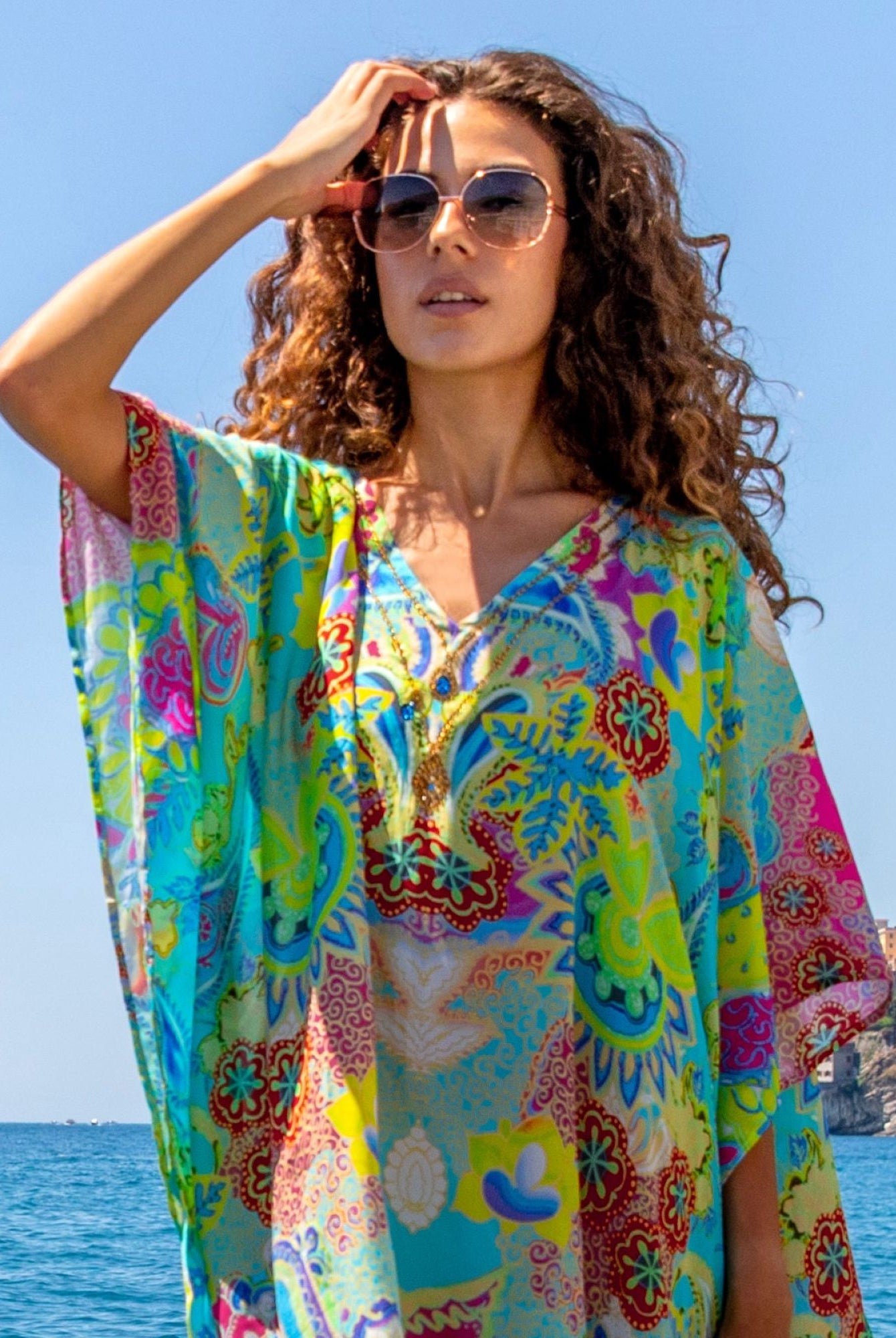 Designer kaftans to wear in the Maldives silk designer beach dresses, cotton beach dresses and silk luxury kaftans perfect for warm holidays to the Maldives