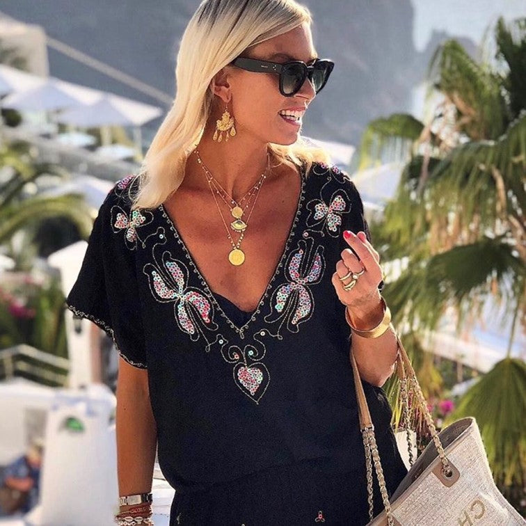black designer beach dresses to wear on holiday by lindsey brown luxury resort wear