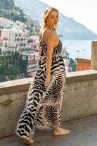 Animal print silk designer maxi dress to wear on holiday by Lindsey Brown resort wear