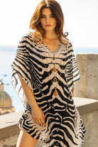 Animal print designer beach cover ups to wear on a Caribbean Cruise by Lindsey Brown resort wear