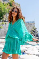 Aqua luxury silk kaftan dress to wear over swimwear by Lindsey Brown silk resort wear
