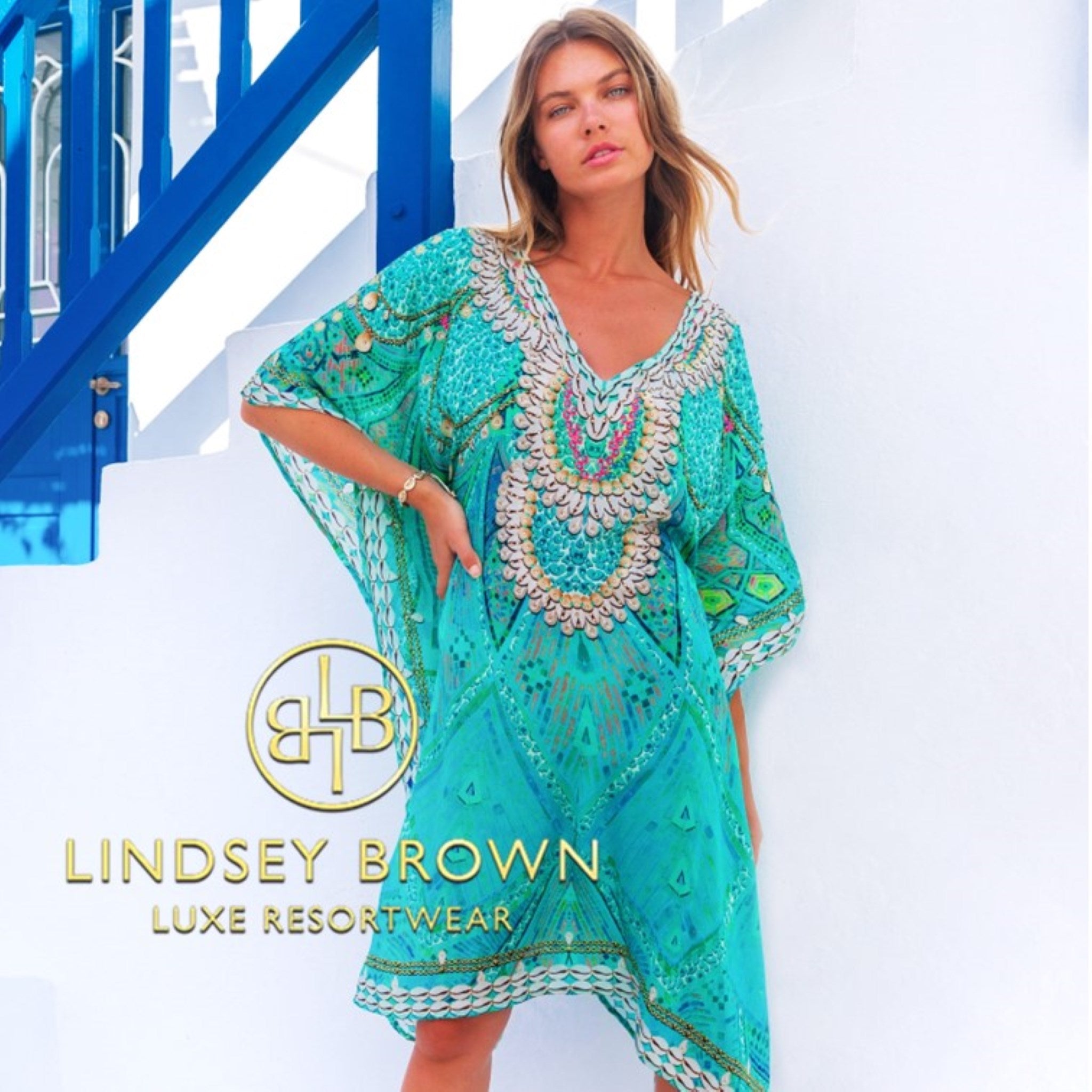 Aqua silk beach cover ups to wear on holiday by Lindsey Brown resort wear