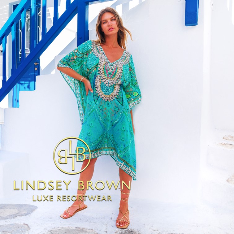 Aqua sparkly beach coverups and beach kaftans seen on A Place in the Sun on TV