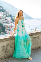 Aqua white silk floaty maxi dresses to wear on holiday by Lindsey Brown luxury resort wear