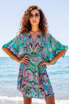 Aqua Drop Waist silk designer Beach Dress in aqua and black silk crepe is a stunning new printed silk beach dress by luxury resort wear Lindsey Brown, such a flattering style