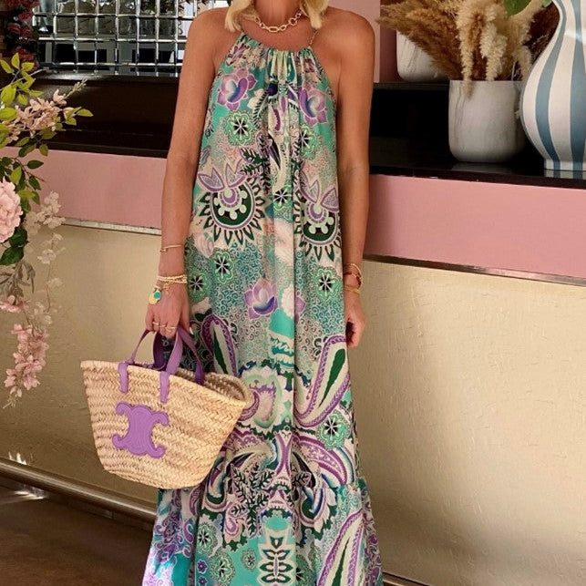 Aqua silk maxi dress to wear on holiday by Lindsey Brown luxury resort wear 