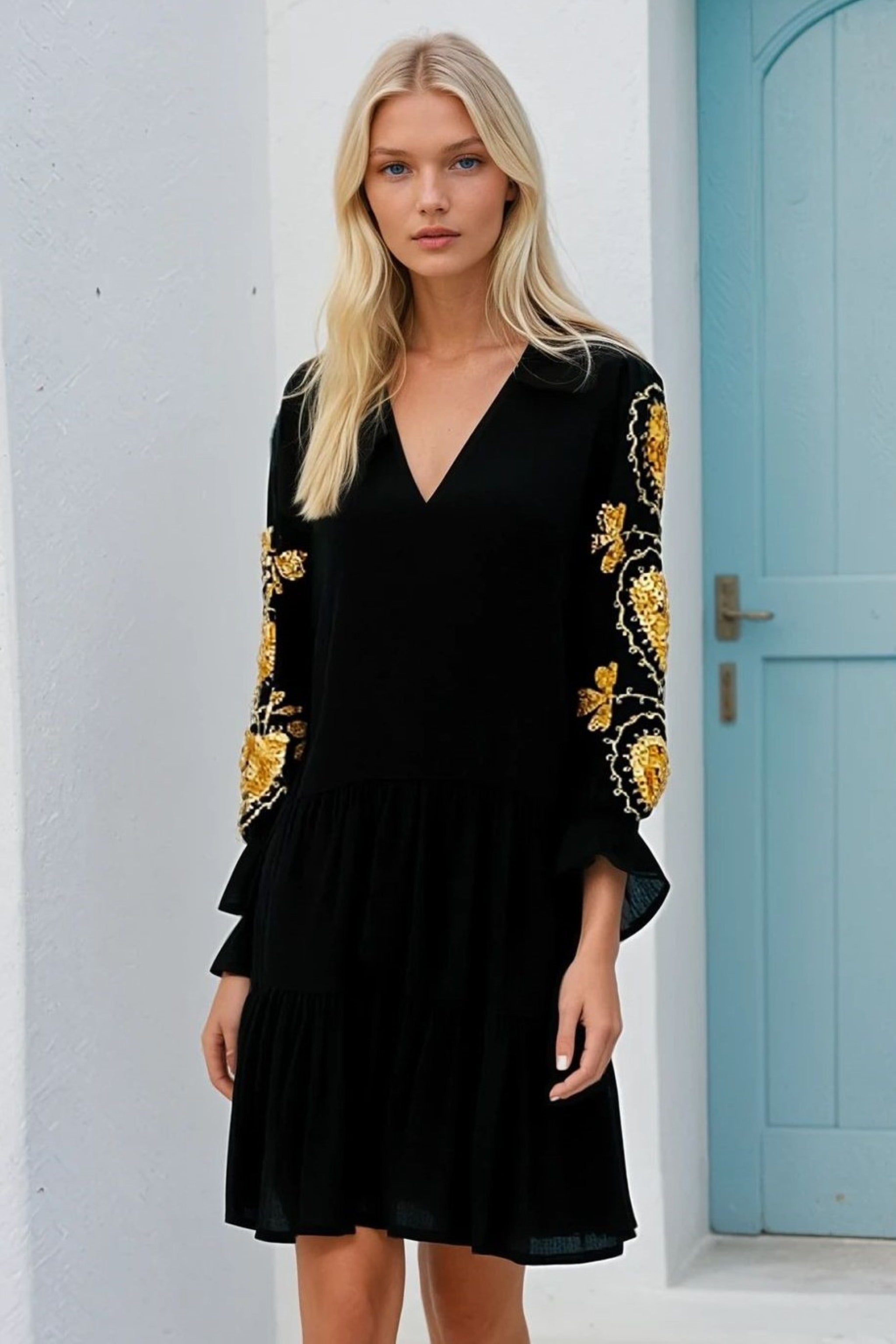 Black gold cotton knee length dress to wear on holiday by Lindsey Brown resort wear