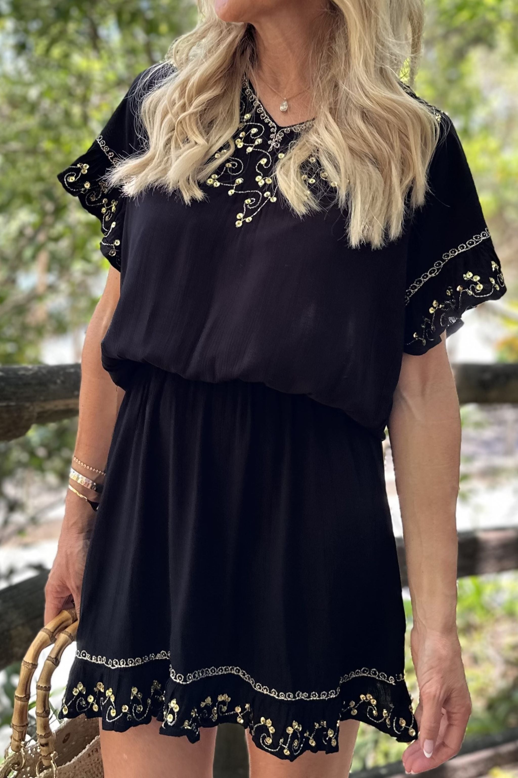 Black gold drop waisted beach dress to wear on a Caribbean Cruise by Lindsey Brown designer beachwear and resort wear