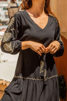 Black gold cotton beach dress to wear on holiday by Lindsey Brown resort wear