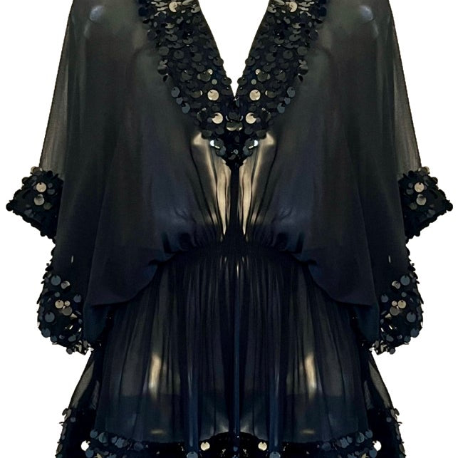 Black silk short deisgner kaftan to wear on holiday by Lindsey Brown luxury resort wear 