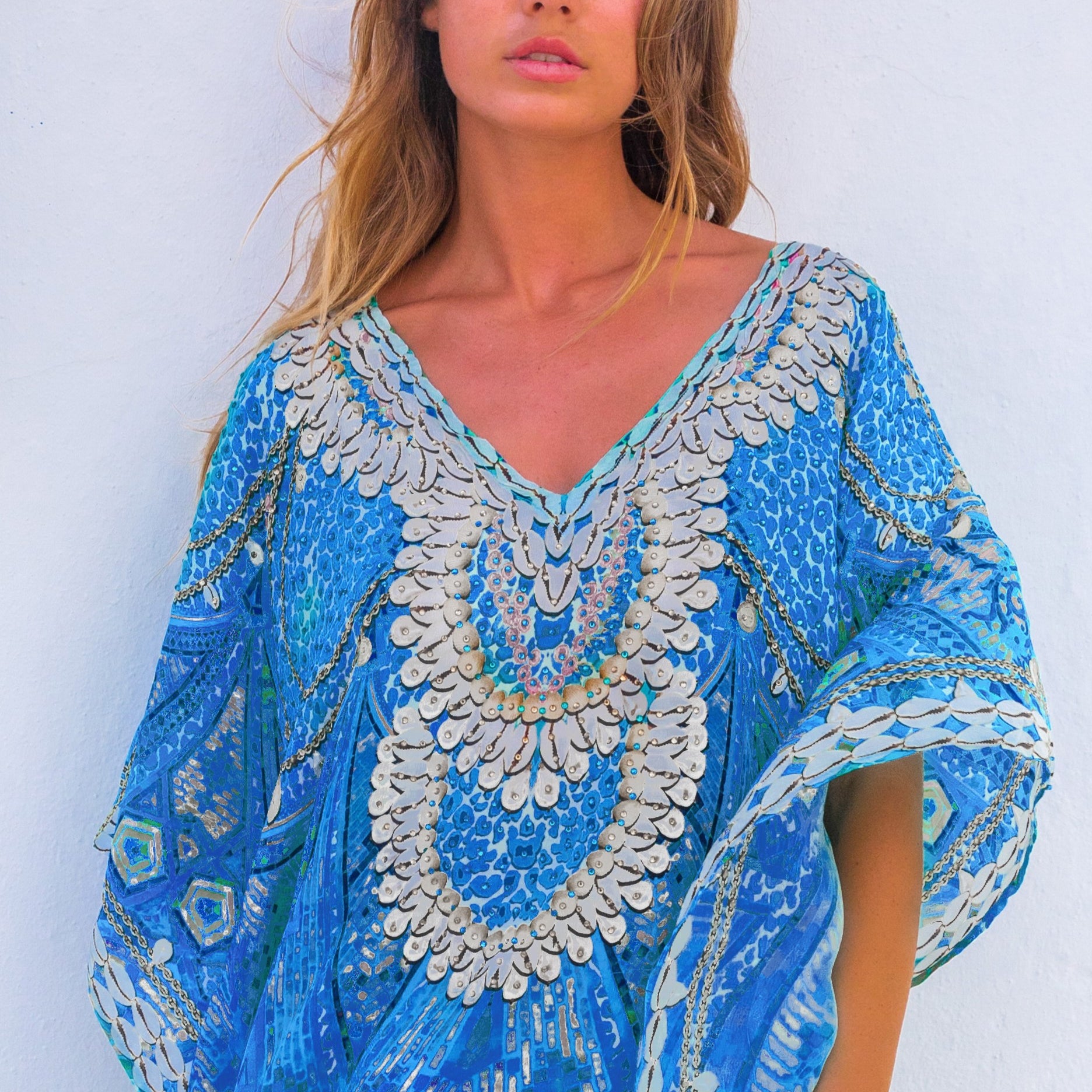 Blue floaty silk designer kaftans by Lindsey Brown resort wear to wear on a Caribbean Cruise holiday