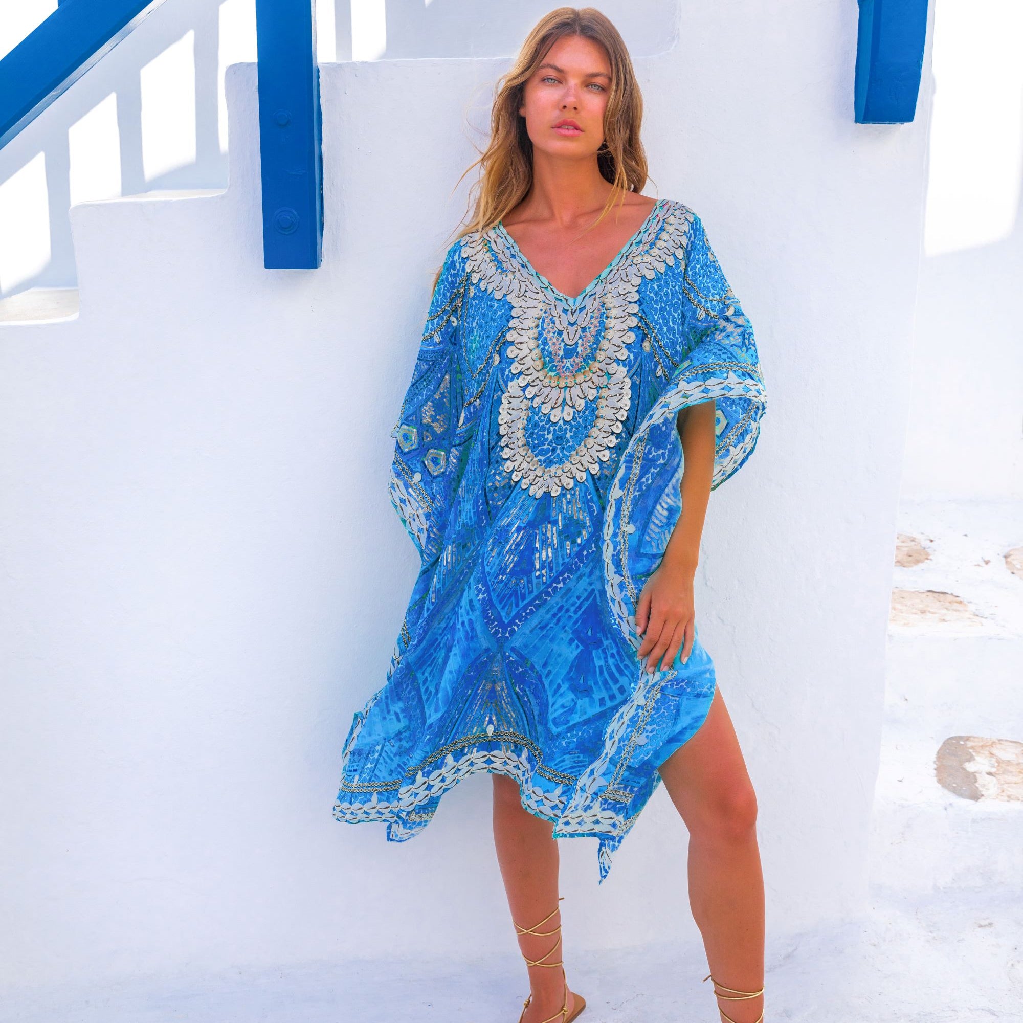 Blue silk  designer kaftans by Lindsey Brown resort wear to wear on a Caribbean Cruise holiday