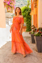 Coral Orange off the shoulder silk maxi dress to wear on holiday by Lindsey Brown luxury resort wear