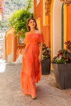 Coral Orange silk maxi dress to wear on holiday by Lindsey Brown