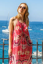 Coral pink black sleeveless maxi dress for winter sun holidays by Lindsey Brown resort wear