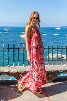 Coral pink black sleeveless maxi dress to wear on holiday by Lindsey Brown luxury resort wear