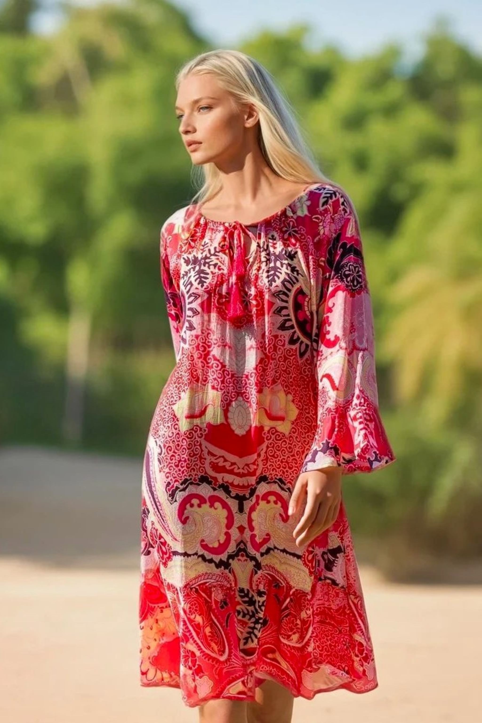 Pink resort wear dress to wear on holiday by Lindsey Brown
