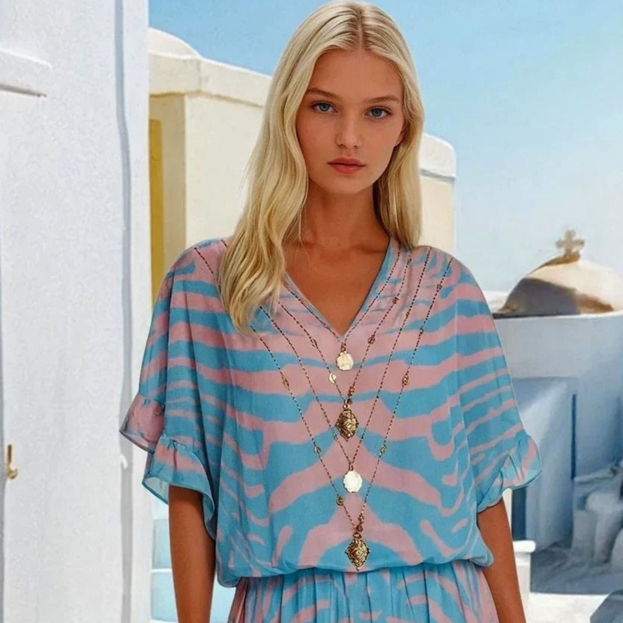Lindsey Brown blue and pink beach dresses to wear on a luxury hoiday