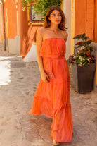 Orange Coral silk maxi dresses to wear on holiday by Lindsey Brown resort wear