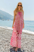 Pink gold floaty silk maxi dress to wear on vacation by Lindsey Brown luxury resort wear