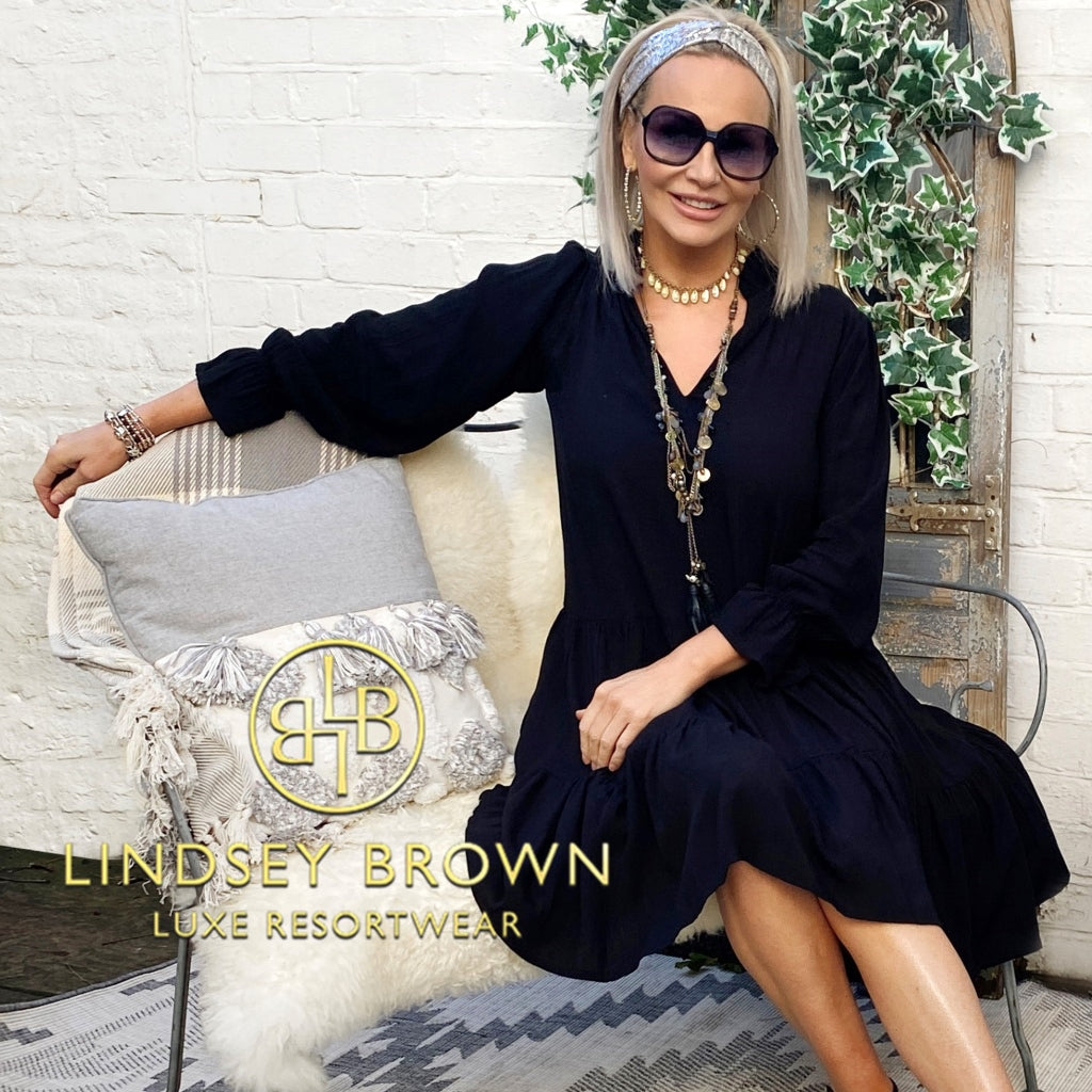 Provence black tirered holiday dress by Lindsey Brown luxury resort wear