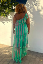 Stunning silk hoilday dresses to wear on holiday by Lindsey Brown designer resort wear