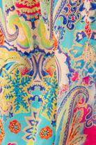 Stunning turuquoise prints to wear on holiday by Lindsey Brown luxurey resort wear