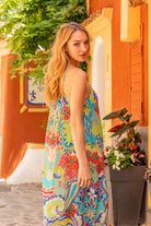 Turquoise silk floaty summer maxi dress by Lindsey Brown luxury resort wear