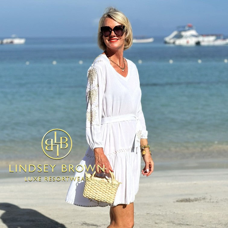 white beach dress to wear in the Caribbean by Lindsey Brown luxury resort wear