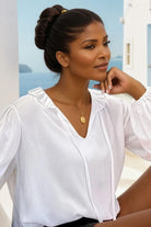 White ruffle cotton summer blouse with a ruffled collar by Lindsey Brown resort wear