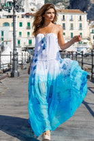 White turquoise silk maxi dresses to wear on holiday by Lindsey Brown resort wear