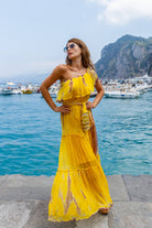 Yellow silk maxi dresses to wear on holiday by Lindsey Brown resort wear