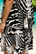 abstract tiger printed short ruffled skirt to wear on warm holidays by Lindsey Brown resort wear