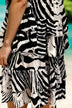 abstract tiger printed short ruffled skirt to wear on warm holidays by Lindsey Brown resort wear