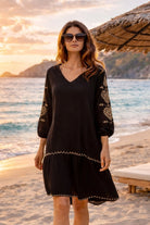 black cotton long sleeved loose fitting beach dress for warm summer holidays by lindsey brown
