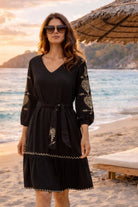 black cotton long sleeved beach dress by lindsey brown resort wear 