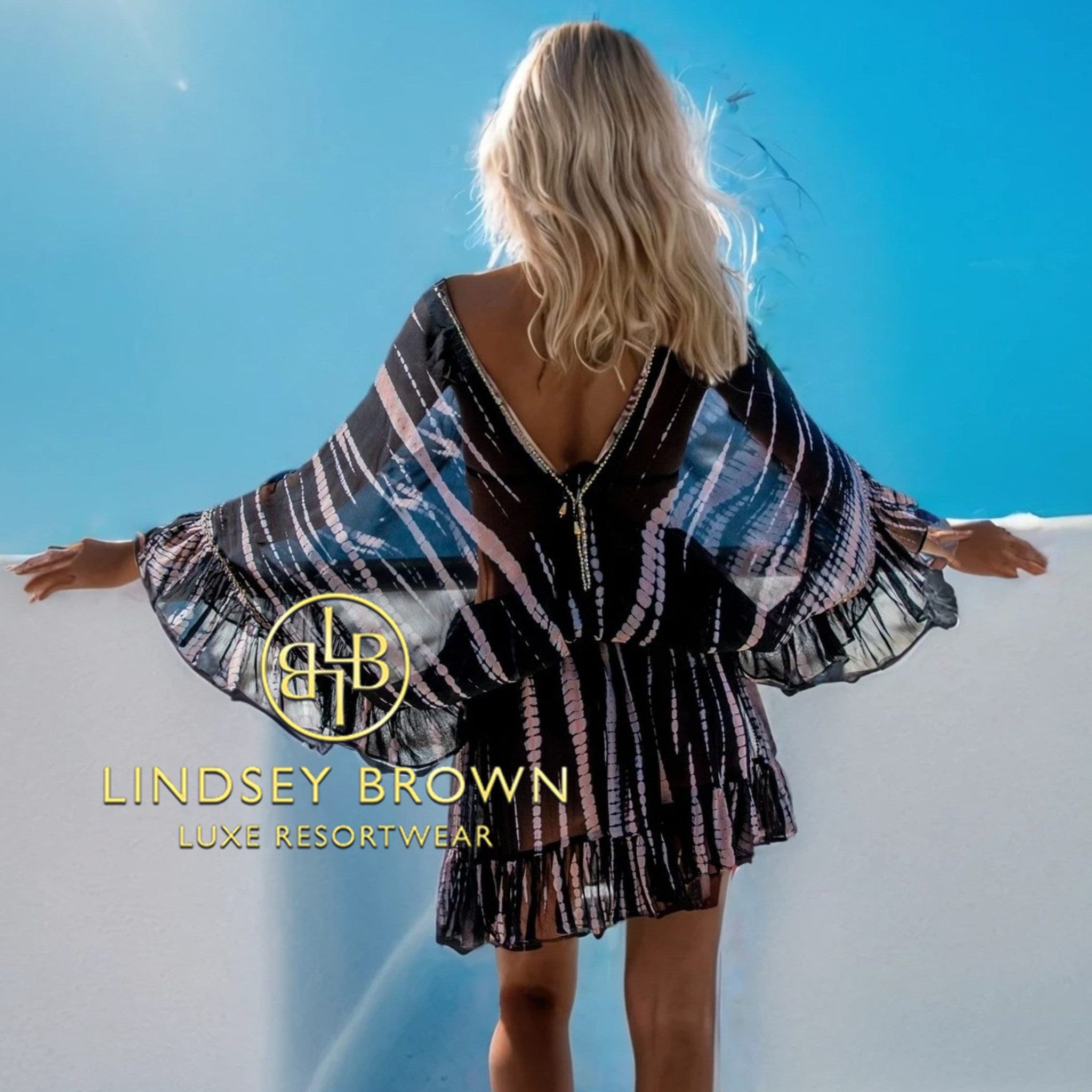 black silk luxury kaftans to wear on holiday by Lindsey Brown resort wear
