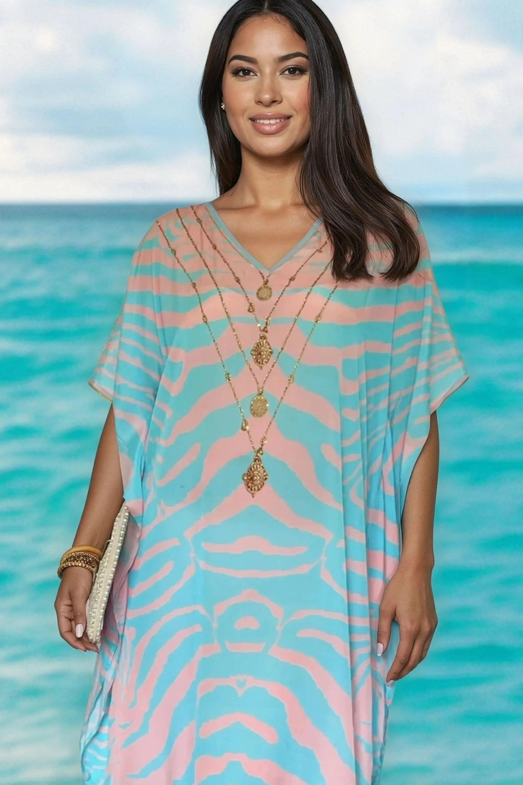 blue and pink silk printed beach cover ups to wear on a cruise holiday by Lindsey Brown