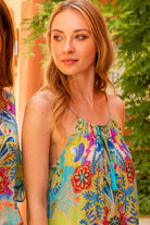 bright turquoise and yellow silk resort wear dresses to wear on holiday by Lindsey Brown resort wear