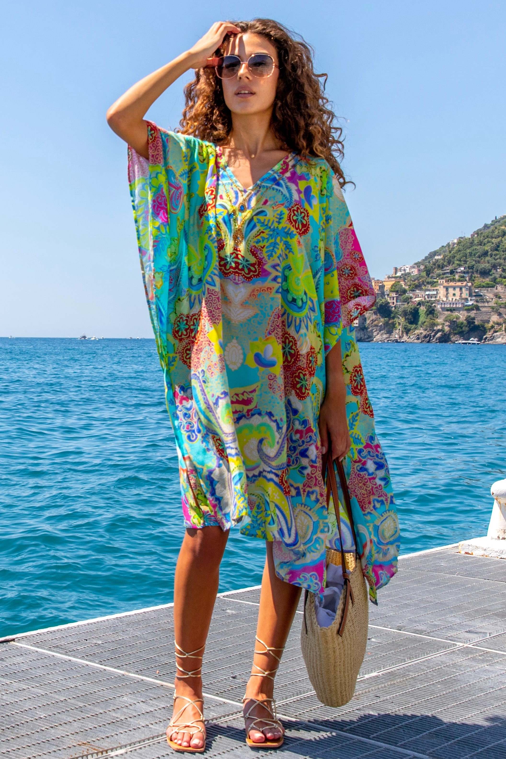 floaty printed silk designer kaftan to wear on holiday by Lindsey Brown luxury resort wear