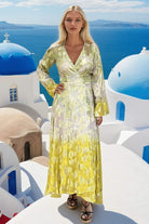 gold and ivory wrap over maxi dress by lindsey brown resort wear