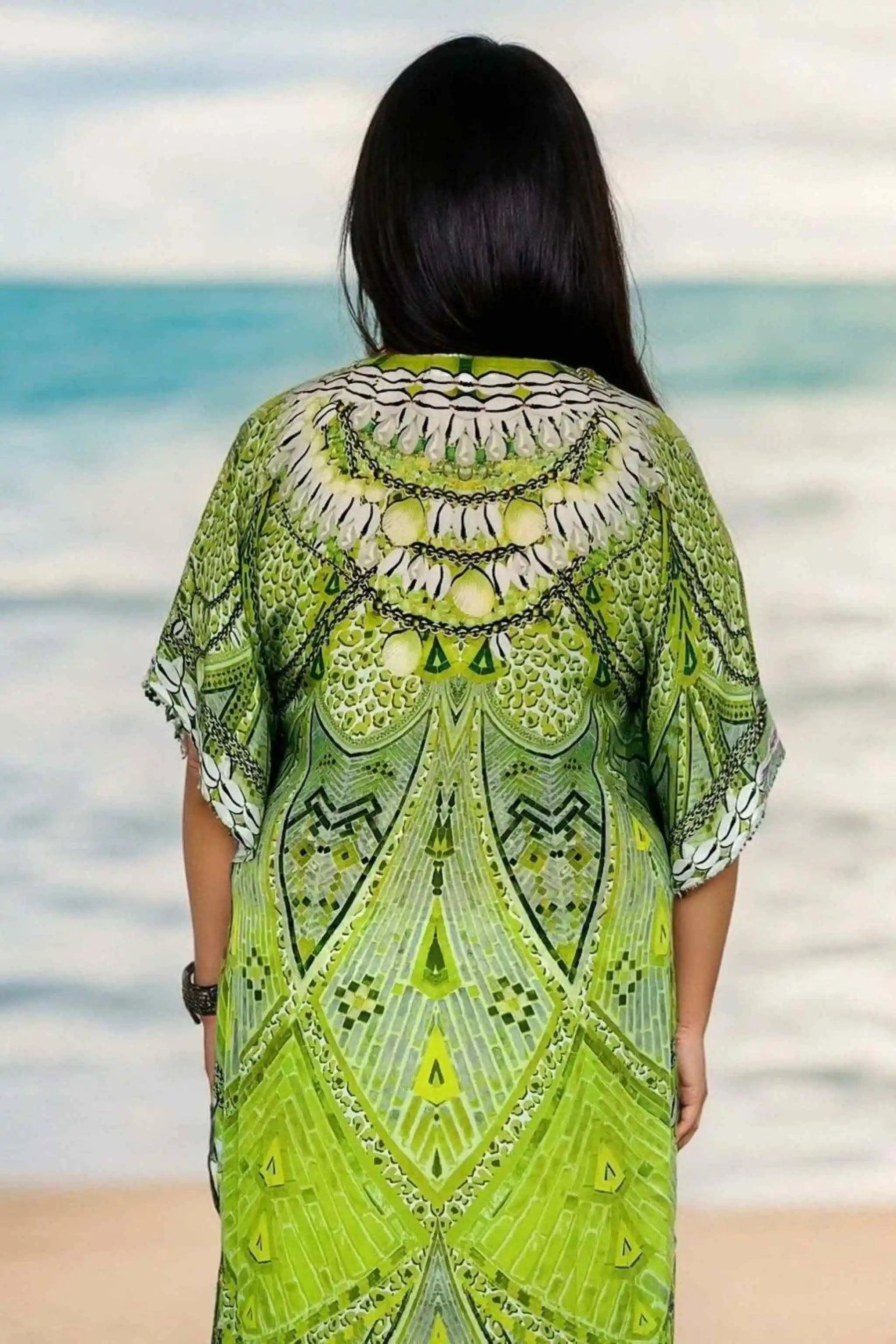 lime green back view of printed beach cover up by Lindsey Brown