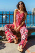 pink floaty beach pants to wear on warm holiday by Lindsey Brown