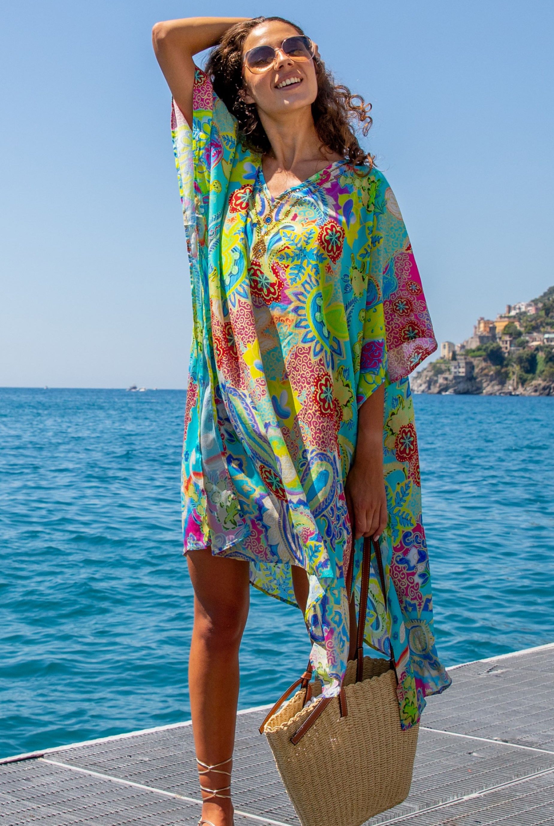 plus size turquoise and yelow silk designer kaftan to wear on holiday by Lindsey Brown luxury resort wear 