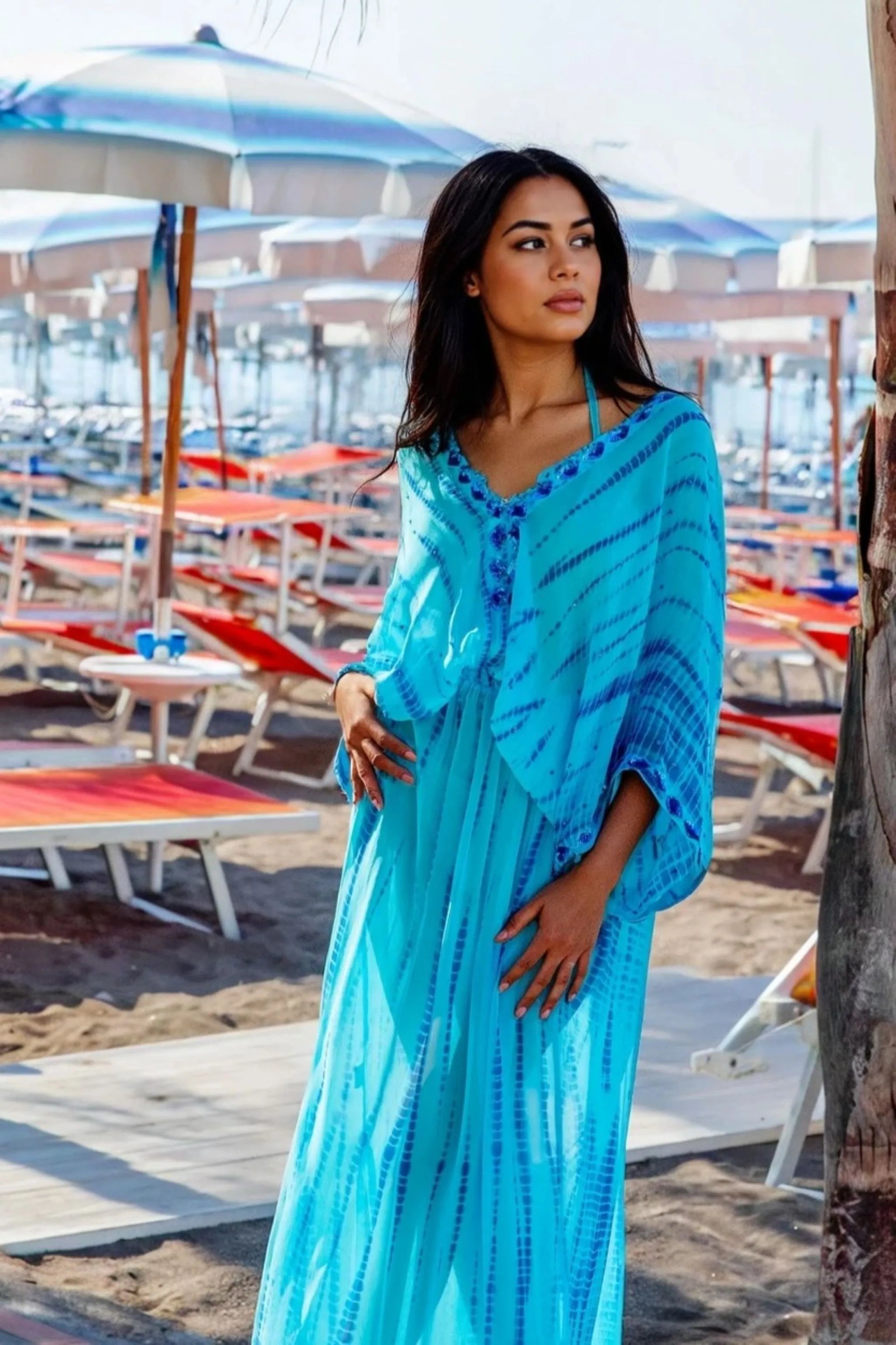 turquoise blue silk maxi kaftans hand beaded by Lindsey Brown resort wear